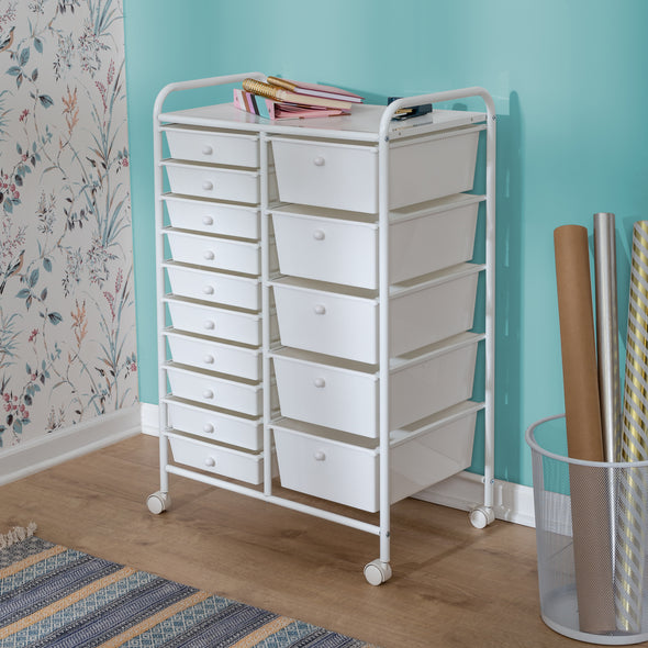 Organize across 10 small and 5 large white drawers with white knobs