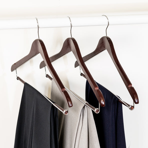 Classic look-and-feel of wooden hangers upgrades a closet’s aesthetic